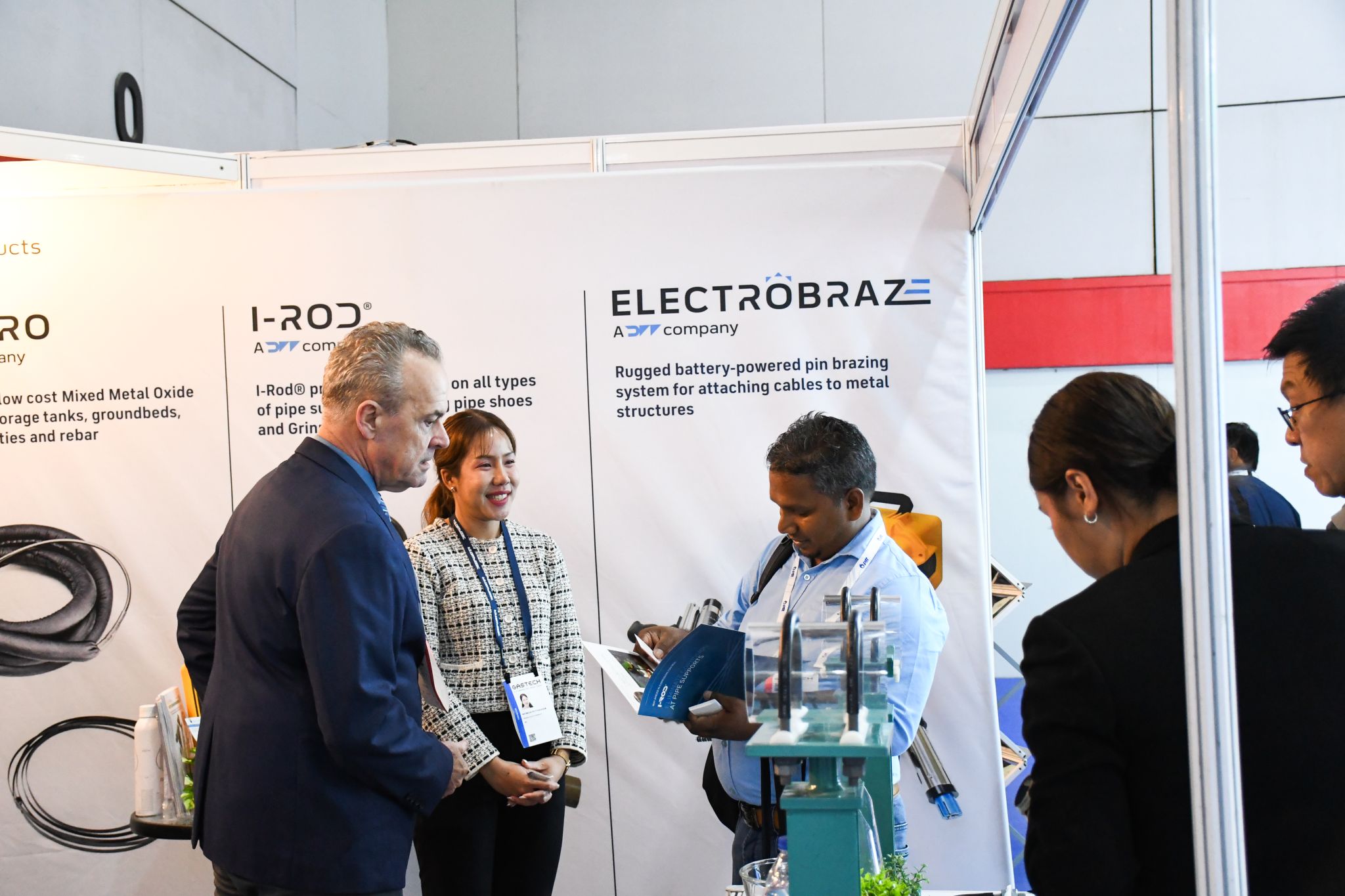 Gastech 2026 exhibition hall at BITEC Bangkok with visitors at the I-Rod pipe supports stand R115