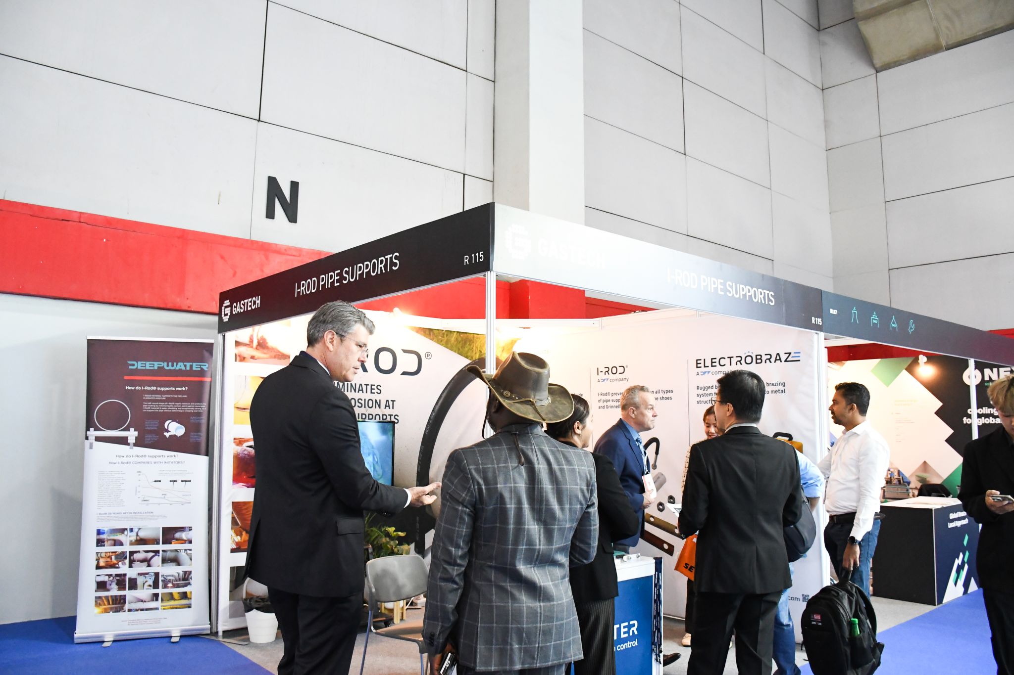Visitors at the Deepwater I-Rod pipe supports exhibition stand during Gastech 2026 in Bangkok