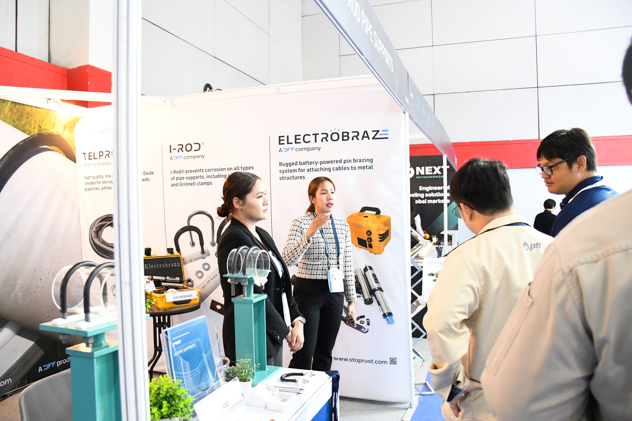 JST Group corrosion control team meeting visitors at the Gastech 2026 exhibition in Bangkok