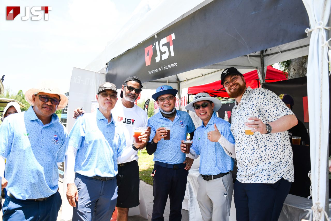 CUEL golfers with the JST Group and Mantl-Ex team at the JST tent.